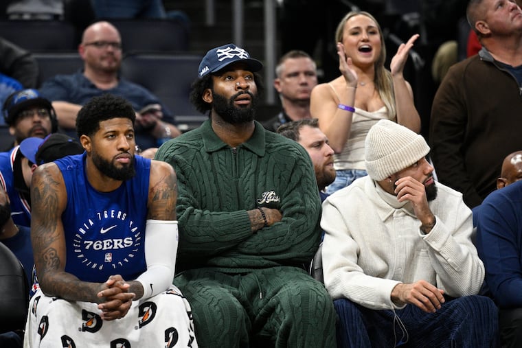 Sixers forward Paul George (left) has been pressed into action at center at times recently because of injuries to Andre Drummond (center) and Joel Embiid.