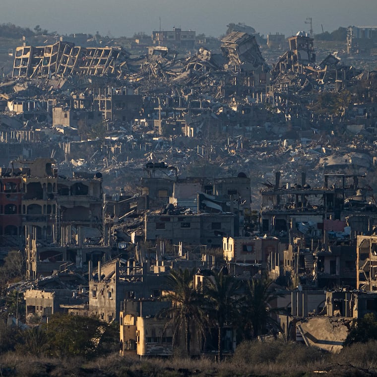 Destroyed buildings are seen inside the Gaza Strip, from southern Israel, on Monday, Jan. 13, 2025. 