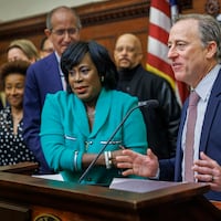 Philadelphia 76ers owner Josh Harris speaks next to Mayor Cherelle L. Parker at a Monday news conference regarding the Sixers changing directions on its controversial Center City arena proposal.