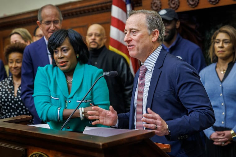 Philadelphia 76ers owner Josh Harris speaks next to Mayor Cherelle L. Parker at a Monday news conference regarding the Sixers changing directions on its controversial Center City arena proposal.