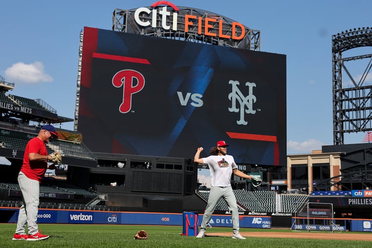 Phillies third base Alec Bohm throws during a workout at Citi Field.