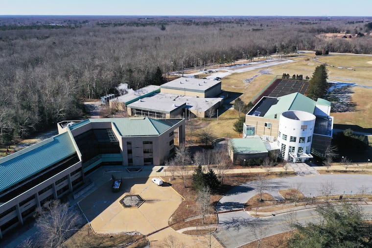 A 2019 image of the former Burlington County College campus in Pemberton Township shows (from left) an academic building, since demolished, and the gym (center) and library, which are now set for demolition as well.