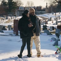 (Left to Right) Cindy and Bryant Heard, at the grave of their son Bryant Heard II, at Northwood Cemetary, in Philadelphia, Monday, January 31, 2022. Their son was fatally shot near their home in Olney last year.