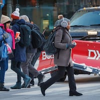 Center City pedestrians bundled up for the winds and cold on Tuesday. They can expect repeats the next two days.