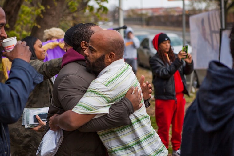 Supporters and recently released individuals embrace during a November 2018 Philadelphia Community Bail Fund bail-out.