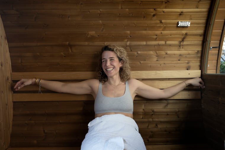 Lindsey Scannapieco , Managing partner at TEAM Scout, is photographed on Thursday, Dec. 26, 2024 in the pop-up sauna at the Swedish American History museum in Philadelphia, Pa.