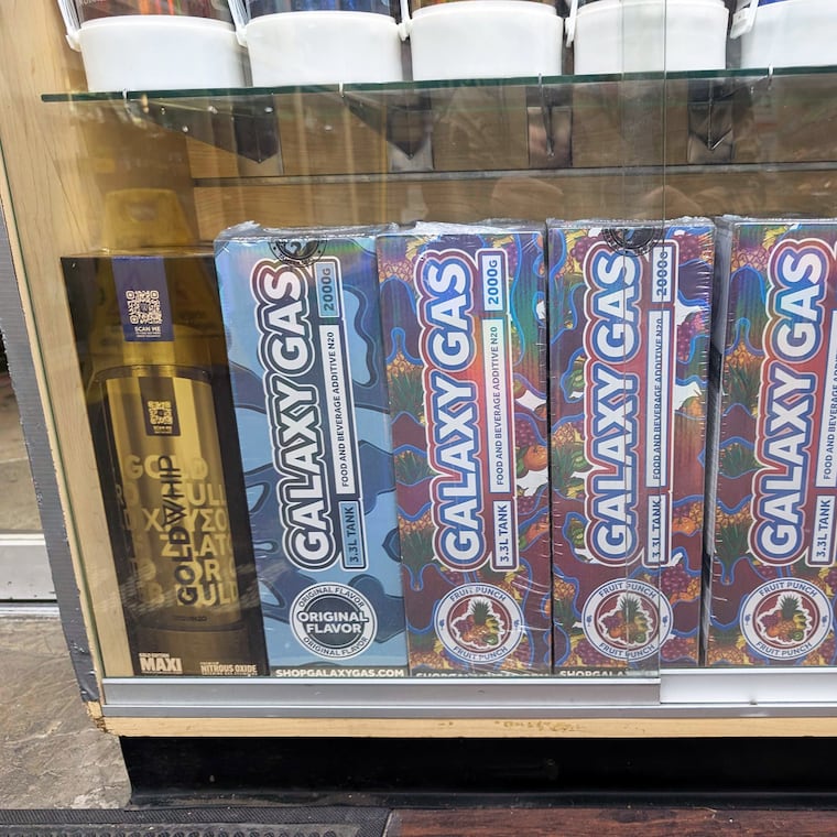 Fruit-punch-flavored “Galaxy Gas” brand nitrous oxide tanks for sale on the Lower East Side of Manhattan early this month. MUST CREDIT: Shane O'Neill/The Washington Post