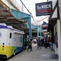 A Kensington Hospital wound care outreach van welcomes patients in 2023. The authors write that deploying mobile treatment units to reach people where they are is one of the ways to treat the wave of medetomidine or "rhino tranq" that is involved in one in five fentanyl-related deaths in Philadelphia.