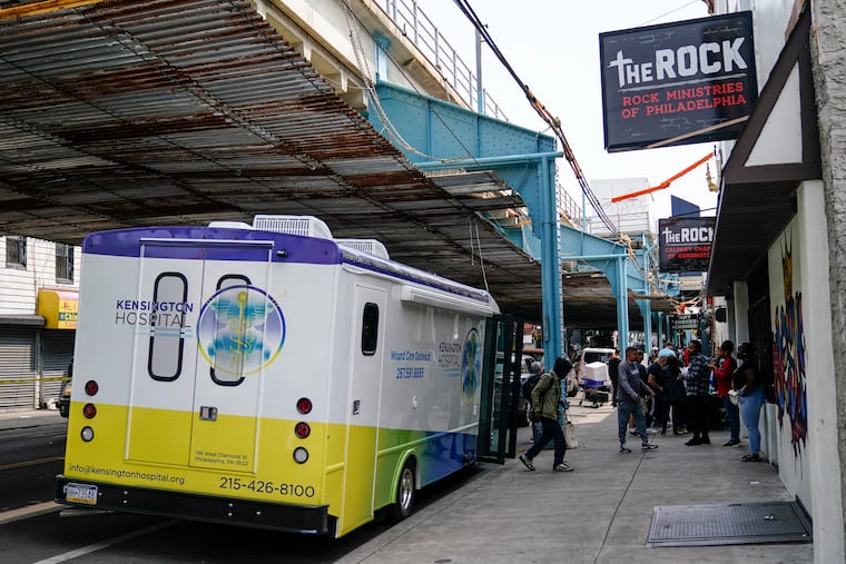 A Kensington Hospital wound care outreach van welcomes patients in 2023. The authors write that deploying mobile treatment units to reach people where they are is one of the ways to treat the wave of medetomidine or "rhino tranq" that is involved in one in five fentanyl-related deaths in Philadelphia.