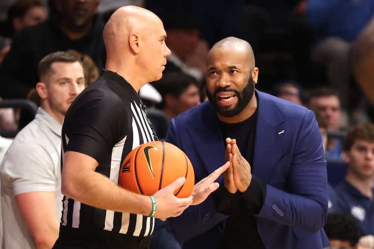 Villanova coach Kyle Neptune strikes a prayerful pose as he pleads with an official during a game against UConn at Finneran Pavilion on Jan. 8, 2025.