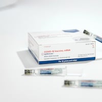 This photo provided by Moderna in August 2024 shows packaging and syringes for the company's updated COVID vaccine for ages 12 and older. Philadelphia health officials are encouraging residents to get vaccinated with one of three updated COVID vaccines this fall.