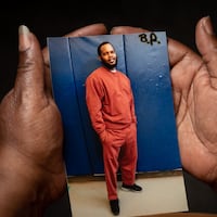 Theresa Westman holds a photo of her son Rasheem Hall, who's serving life in prison for a murder that the prosecution witnesses maintain he had no role in.